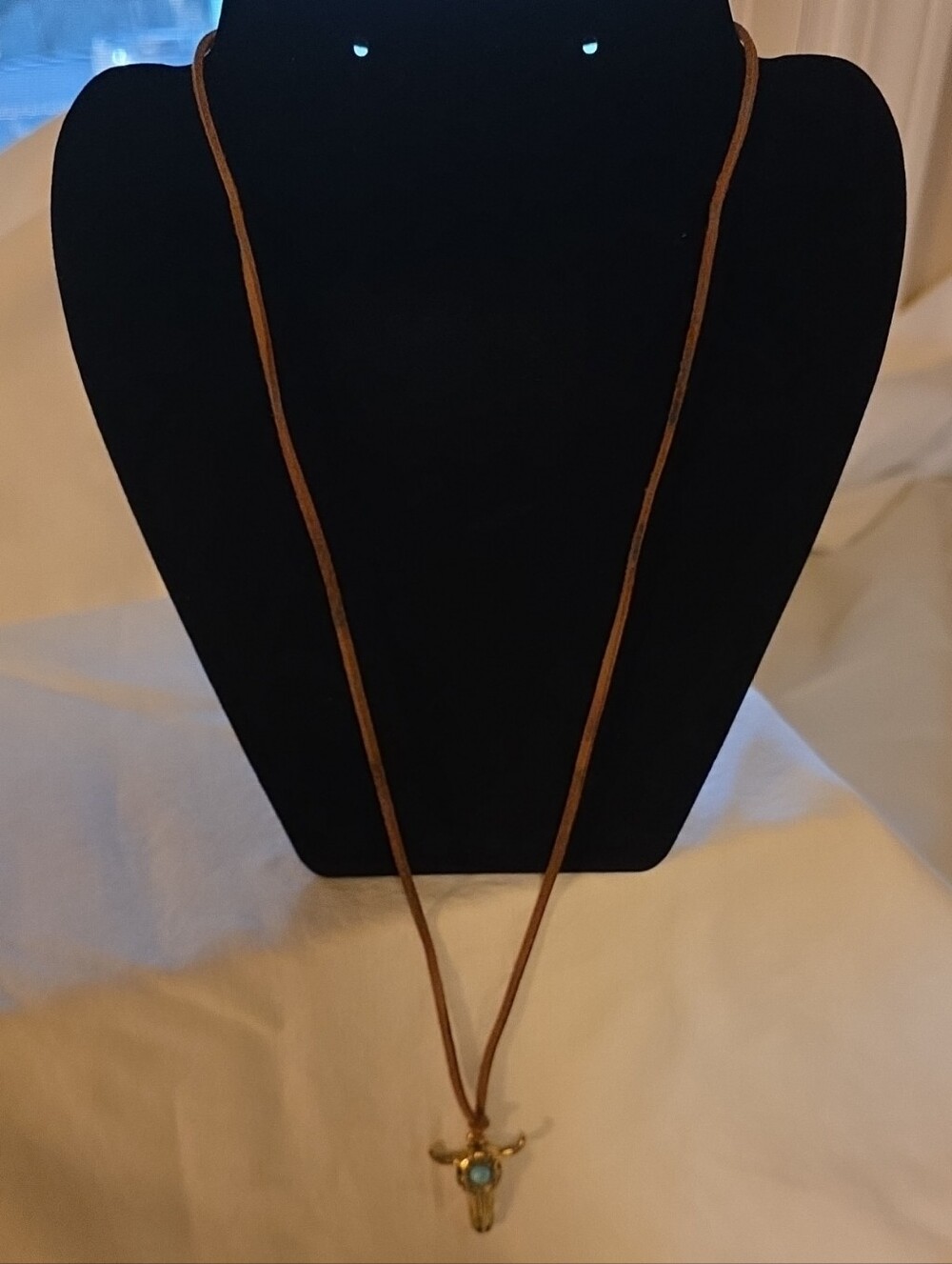 Brown Leather Necklace with Turquoise Accent Bull Skull Pendant